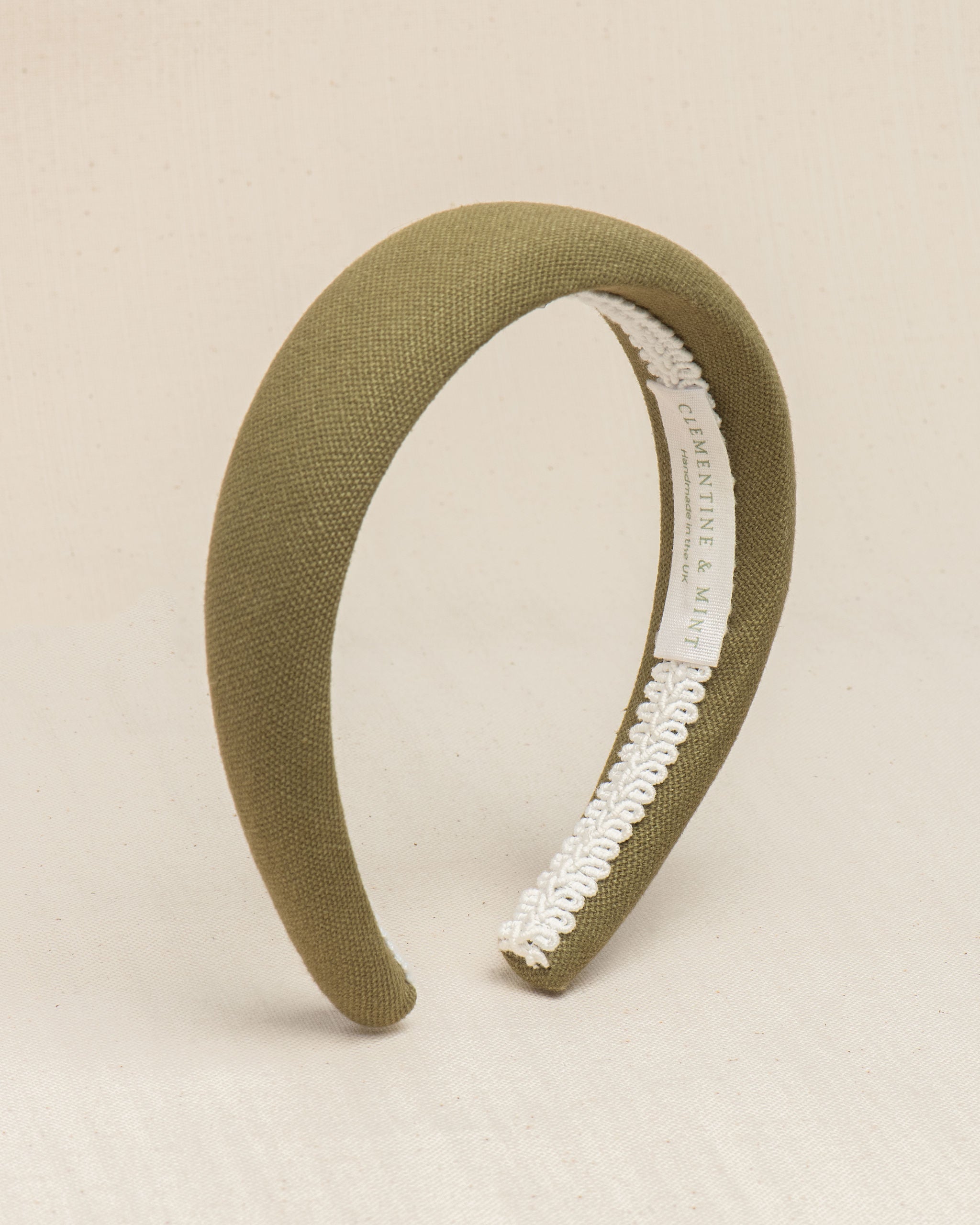 Khaki green headband with white cotton braid