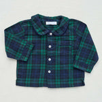Green and blue plaid tartan shirt with a collar on a light gray background
