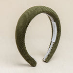 Olive green corduroy headband with a white soft cotton braid