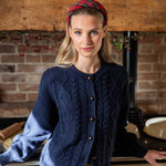 women wearing red tartan headband