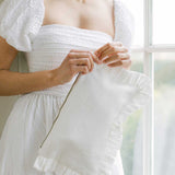 The White Linen Ruffled Pouch