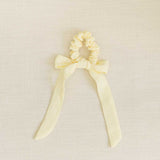 THE LIGHT YELLOW SCRUNCHIE WITH BOW