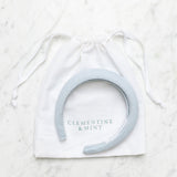 Light blue linen headband, hair accessory, Bridesmaid hair accessory . Clementine and mint linen drawstring bag.