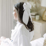 THE WHITE LINEN BOW