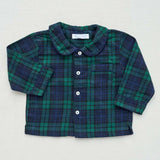 Green and blue plaid tartan shirt with a collar on a light gray background
