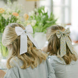 THE WHITE AND BLUE CHILDREN'S BOW
