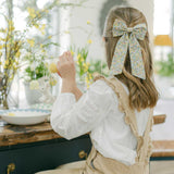THE YELLOW FLORAL CHILDREN'S BOW MADE WITH LIBERTY FABRIC