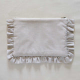 Beige Gingham Fabric pouch with ruffled edge on a beige background