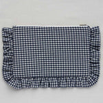 Blue and white checkered pouch with ruffled edges on a light gray background