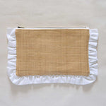 Pouch with ruffled white edge and woven brown center on a light beige background