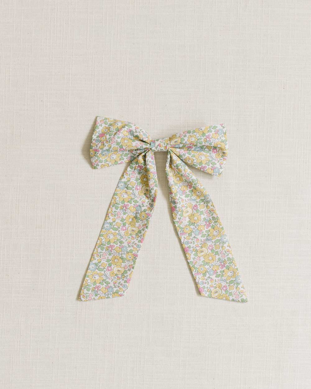 THE YELLOW FLORAL BOW MADE FROM LIBERTY FABRIC