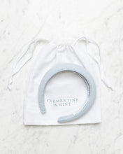 Load image into Gallery viewer, Light blue linen headband, hair accessory, Bridesmaid hair accessory . Clementine and mint linen drawstring bag. 
