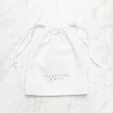 THE WHITE LINEN CLASSIC BOW