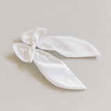 THE WHITE SATIN BOW