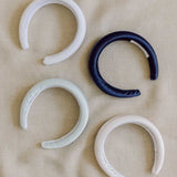 THE NAVY SATIN PADDED HEADBAND