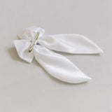 THE WHITE SATIN BOW