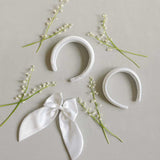 THE WHITE SATIN BOW